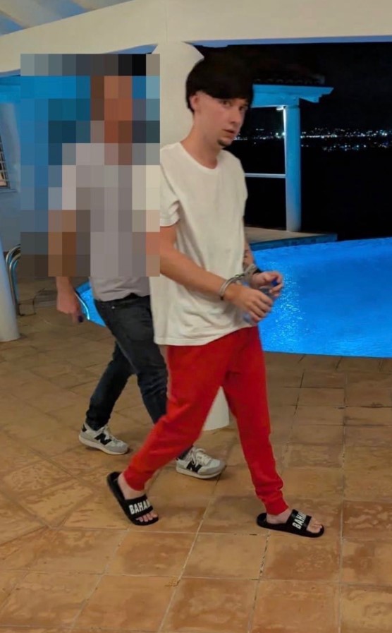 Fotografía de John Daghita en cuestodia policial.